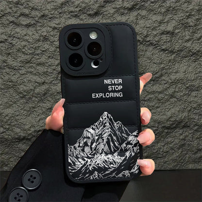 Never Stop Exploring Puffer Phone Case